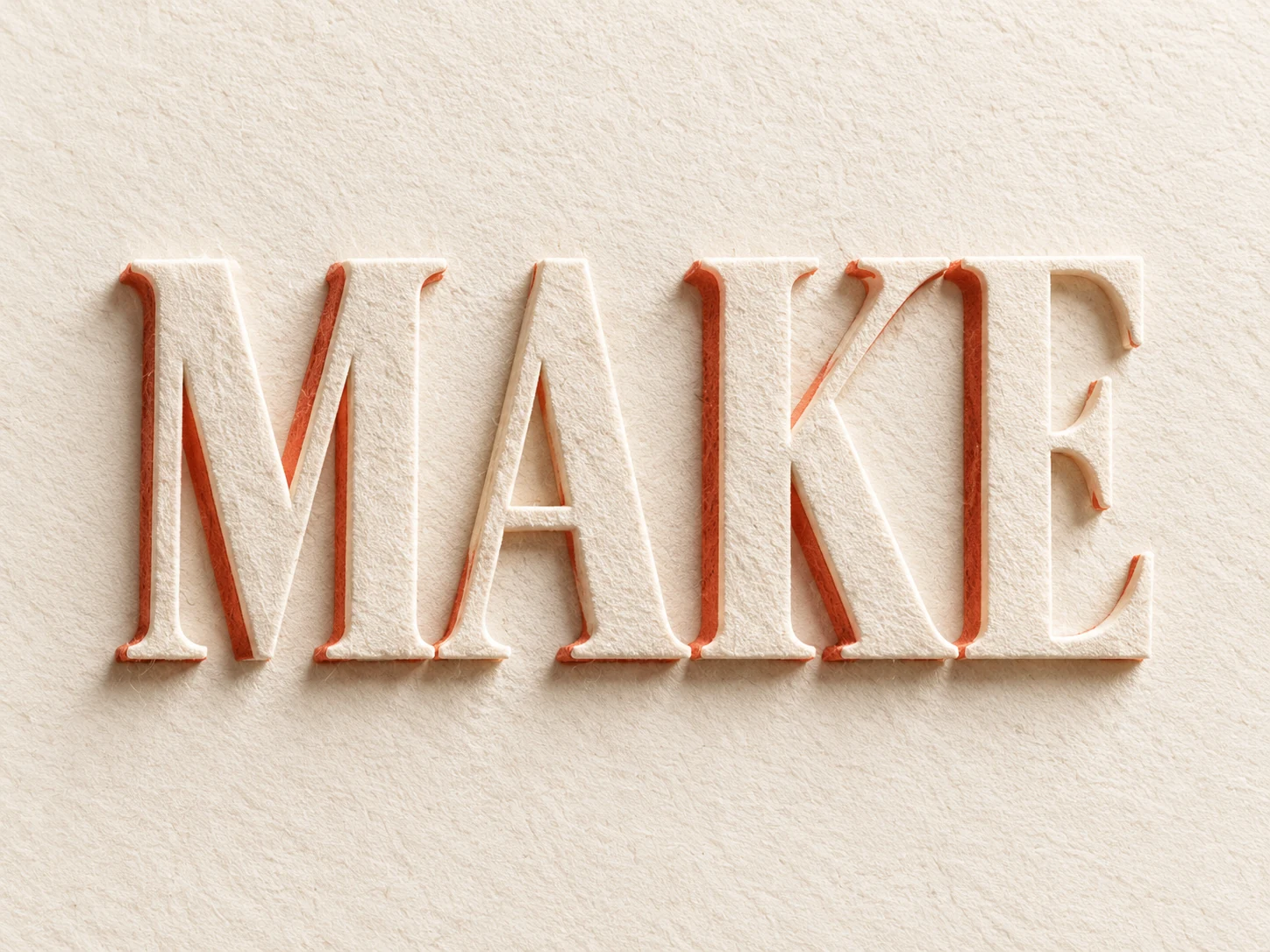 MAKE in ivory paper relief with terracotta edges